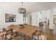 Formal dining room with hardwood floors and modern chandelier at 2120 Gross Dam Rd, Golden, CO 80403