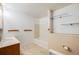 Full bathroom with shower-tub combination, updated vanity, and built in wall shelving at 34586 Morgan Trl, Elizabeth, CO 80107