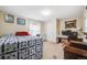 Bedroom view with a bed, art on the walls, a desk and chair near a window at 34586 Morgan Trl, Elizabeth, CO 80107