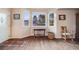 Bright entryway with hardwood floors, natural light from bay windows, and cozy welcoming atmosphere at 34586 Morgan Trl, Elizabeth, CO 80107