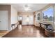 Hardwood flooring throughout, a ceiling fan and many windows to let in light add to the appeal of this living space at 34586 Morgan Trl, Elizabeth, CO 80107