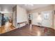 Inviting open space with hardwood floors, seamlessly connecting the living room to other parts of the home at 34586 Morgan Trl, Elizabeth, CO 80107
