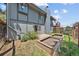 Backyard area featuring raised garden beds and lush foliage, ideal for outdoor relaxation and gardening at 812 Aspen Rd, Golden, CO 80401