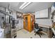 Organized basement includes laundry facilities, a sauna, and a workspace area at 812 Aspen Rd, Golden, CO 80401