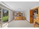 A serene primary bedroom with a slider, closet and private outdoor access at 812 Aspen Rd, Golden, CO 80401