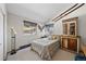 Bedroom with vintage decor and views of the surrounding neighborhood through large windows at 812 Aspen Rd, Golden, CO 80401