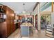 Modern kitchen with granite countertops, an island, stainless steel appliances, and a breakfast nook at 812 Aspen Rd, Golden, CO 80401