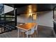 The covered deck offers ample space for dining with an outside entry to the home at 13910 Blue Jay Ln, Larkspur, CO 80118