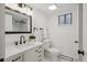 Updated bathroom featuring subway tile, black hardware, modern fixtures and a shower at 13910 Blue Jay Ln, Larkspur, CO 80118