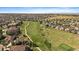 The community features an extensive golf course, manicured landscaping, and numerous well-maintained homes at 22023 E Heritage Pkwy, Aurora, CO 80016