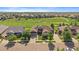 Spacious single-Gathering home near a golf course, surrounded by lush landscaping and manicured lawns at 22023 E Heritage Pkwy, Aurora, CO 80016