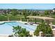 Enjoy community living at this pool with stunning golf course views, covered pergola, and mature trees at 22023 E Heritage Pkwy, Aurora, CO 80016