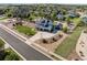 Aerial view of a two-story home with a three-car garage, a separate one car garage and landscaped yard at 5181 Appleton Way, Castle Rock, CO 80104