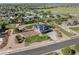 Aerial view of a two-story home with a three-car garage, a separate one car garage and landscaped yard at 5181 Appleton Way, Castle Rock, CO 80104
