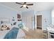 Serene bedroom featuring a ceiling fan, a comfortable bed and cozy decor at 5181 Appleton Way, Castle Rock, CO 80104