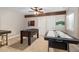 Spacious game room with a foosball table, air hockey and mounted dart board provides space for entertainment at 5181 Appleton Way, Castle Rock, CO 80104
