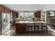 Well-equipped kitchen features granite countertops, stainless steel appliances, and a large island at 5181 Appleton Way, Castle Rock, CO 80104
