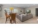 Inviting living room with natural light, a cozy seating area, and a stylish table and chairs at 5181 Appleton Way, Castle Rock, CO 80104