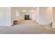 Expansive basement area with neutral carpeting, providing a blank canvas for various uses at 8137 Ralston Creek Ave, Littleton, CO 80125