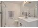 Elegant bathroom with a glass-enclosed shower and a sleek vanity, providing a spa-like experience at 8137 Ralston Creek Ave, Littleton, CO 80125