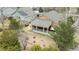 Aerial view of a home featuring a covered patio and landscaped backyard at 1479 Short Grass Ct, Castle Rock, CO 80109