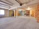 Unfinished basement space, ready to customize with built-in shelves and ample room for storage and activities at 5336 High Rd, Evergreen, CO 80439