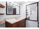 Bathroom featuring double vanity, large mirrors, and recessed lighting at 10563 Pierson Cir, Broomfield, CO 80021