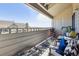 Private balcony offering outdoor living space and views of the surrounding neighborhood at 12093 W Cross Dr # 304, Littleton, CO 80127