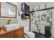 Updated bathroom featuring modern fixtures, stylish tiling, and sleek vanity at 12093 W Cross Dr # 304, Littleton, CO 80127