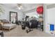 Bonus room with a full mirror, sitting area, exercise equipment and an abundance of natural light at 12093 W Cross Dr # 304, Littleton, CO 80127