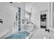 Elegant bathroom featuring a freestanding tub and shower at 6610 S Waco Way, Aurora, CO 80016