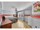 bedroom with gray and red accent walls at 6610 S Waco Way, Aurora, CO 80016