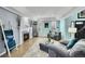 Cozy living room with fireplace and hardwood floors at 6610 S Waco Way, Aurora, CO 80016