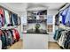 Large walk-in closet with ample shelving and hanging space at 6610 S Waco Way, Aurora, CO 80016