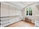 Walk-in closet with custom shelving and storage solutions for organization at 770 Locust, Denver, CO 80220