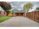 Open garage with basketball hoop and additional storage space at 770 Locust, Denver, CO 80220