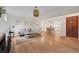 Bright living room with hardwood floors, neutral tones, and an open floor plan at 770 Locust, Denver, CO 80220