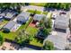 A backyard with well maintained grass, a small shed and a privacy fence offer a comfortable outdoor living space at 1955 Ingalls St, Lakewood, CO 80214