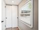 Hallway with closet, window view of backyard at 1955 Ingalls St, Lakewood, CO 80214