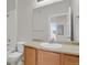 Bathroom featuring a sink, vanity, mirror, toilet, and a bathtub with shower at 14321 E Tennessee Ave # 1-301, Aurora, CO 80012