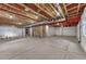 Unfinished basement with exposed ceiling and ductwork ready for customization and finishing at 10761 Hillsboro Cir, Parker, CO 80134