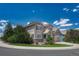 Inviting home with landscaped front yard, two-car garage, and charming stone accents at 10761 Hillsboro Cir, Parker, CO 80134