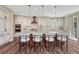 Gourmet kitchen featuring a large island with seating, stainless steel appliances, and abundant cabinet space at 10761 Hillsboro Cir, Parker, CO 80134
