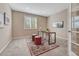 Cozy office featuring neutral carpet, shutters, and space to be productive at 10761 Hillsboro Cir, Parker, CO 80134