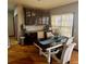 This is a formal dining room complete with chandelier and seating for 8 at 13291 N Harback Rd, Bennett, CO 80102