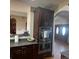 Stainless steel oven combination within kitchen, plus granite countertops at 13291 N Harback Rd, Bennett, CO 80102