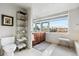 Spa-like bathroom with a double vanity, and a large window offering city views at 1411 Wynkoop St # 806, Denver, CO 80202