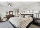 Spacious main bedroom with king-size bed and ceiling fan at 1411 Wynkoop St # 806, Denver, CO 80202