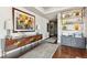 Stylish entryway showcasing a mid-century modern console table and hardwood floors at 1411 Wynkoop St # 806, Denver, CO 80202