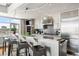 Modern kitchen features stainless steel appliances and breakfast bar at 1411 Wynkoop St # 806, Denver, CO 80202